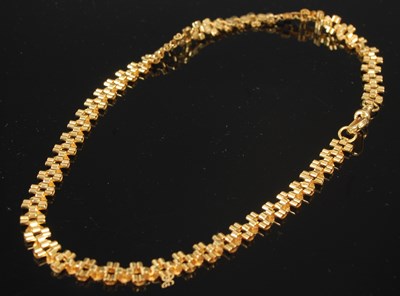 Lot 204A - A 9ct gold necklace, 21.6 grams.