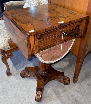 Lot 588A - A 19th century rosewood work table, the...
