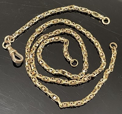 Lot 189B - A yellow metal Albert chain, in two parts, the...
