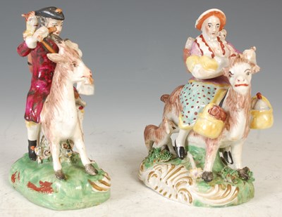 Lot 283 - A pair of 19th century Staffordshire pottery...