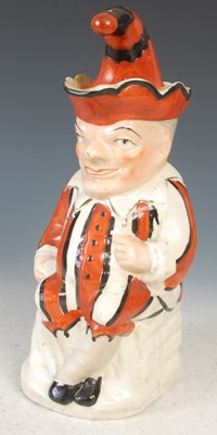 Lot 389 - A 19th century English pottery Toby Jug and...