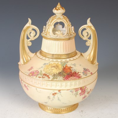 Lot 478 - A Royal Worcester ivory ground twin-handled...