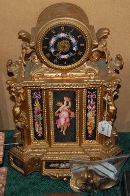 Lot 364 - A gilt metal and porcelain mounted clock with...