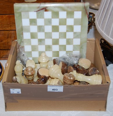 Lot 403 - Box - Hardstone chess pieces, brass and white...