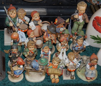 Lot 367 - A collection of Hummel figures comprising two...