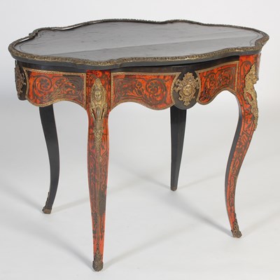 Lot 780 - A 19th century ebonised brass and red...