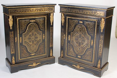 Lot 706 - A pair of 19th century ebonised and brass...