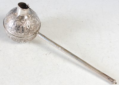 Lot 159 - A South American embossed white metal mate tea...
