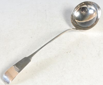 Lot 145 - An Irish silver large soup ladle, by Samuel...