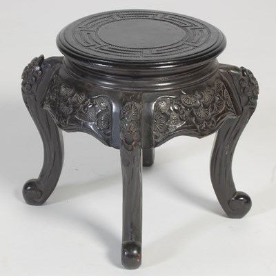 Lot 502 - A small Japanese darkwood stand, the circular...