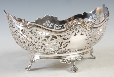 Lot 119 - A pierced oval boat shaped fruit dish, by...