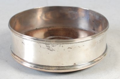 Lot 153 - A George III Irish silver wine coaster, by...