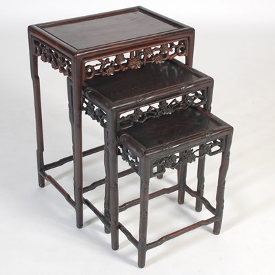 Lot 776 - A nest of three Chinese darkwood occasional...