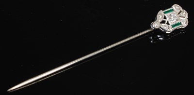 Lot 221 - An Art Deco tie pin, set with diamonds and two...