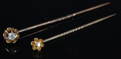 Lot 227 - A 15ct gold and diamond single stone tie pin;...