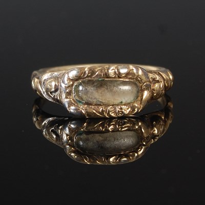 Lot 93 - An Antique mourning ring, with glazed locket...