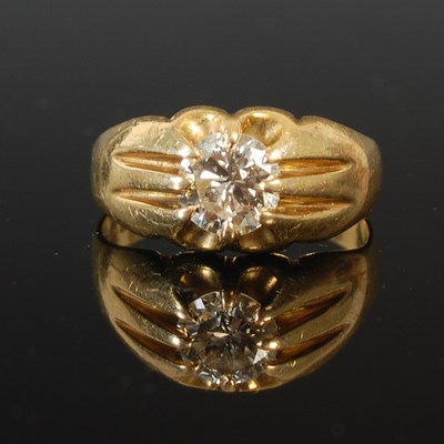 Lot 76 - An 18ct gold ring, set with a single diamond...