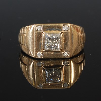 Lot 56 - A 9ct gold gents ring, square shaped, set with...