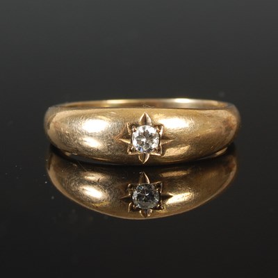 Lot 59 - A 9ct gold ring, with a gypsy set single...