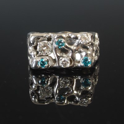 Lot 64 - A 14k white gold gents large dress ring, with...