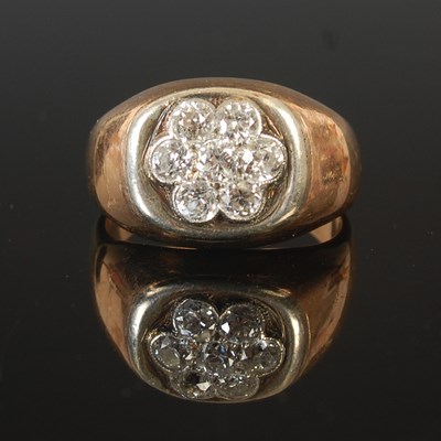 Lot 69 - A gents gold dress ring, set with a cluster of...
