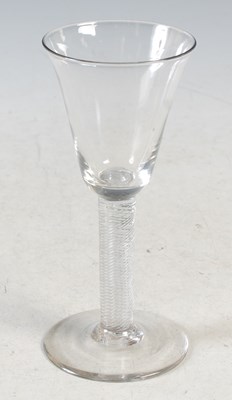 Lot 2 - An antique wine glass, with air twist stem on...