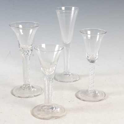Lot 5 - A group of four assorted antique wine glasses,...