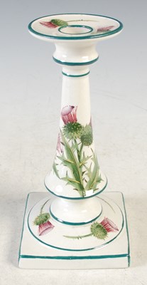 Lot 23 - A Wemyss pottery candlestick decorated with...