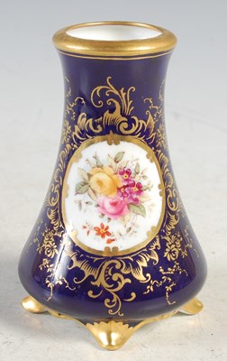 Lot 27 - A Coalport cobalt blue ground porcelain vase,...