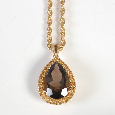 Lot 44 - A 9ct gold necklace suspending 9ct gold...