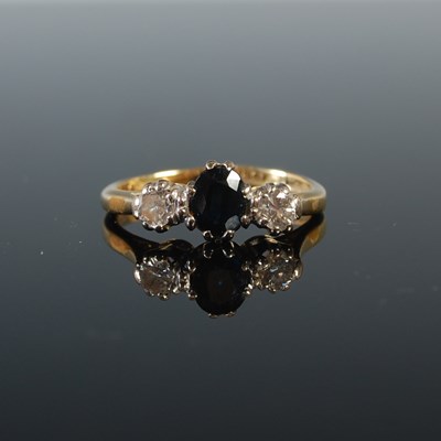 Lot 80 - A white and yellow metal sapphire and diamond...