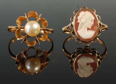Lot 81 - Two yellow metal dress rings, one set with...