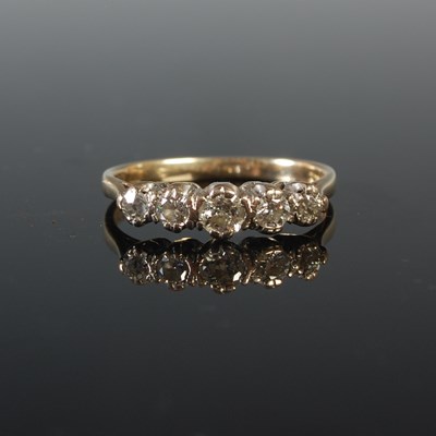 Lot 86 - A 9ct gold and diamond five stone ring, size Q,...