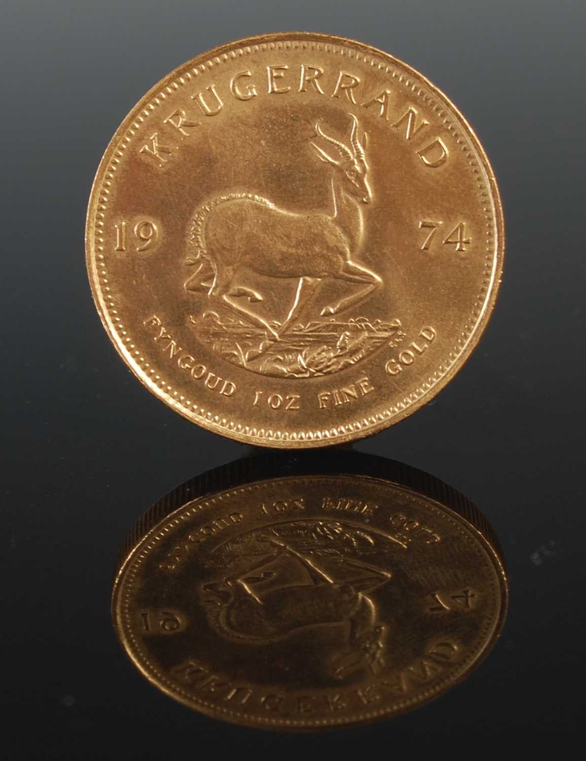 Lot 103 - A 1974 South African gold Krugerrand.