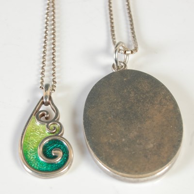 Lot 109 - A silver and green enamel pendant necklace in...