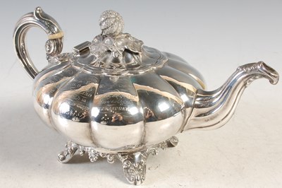 Lot 115 - A Victorian silver melon shaped teapot, London...