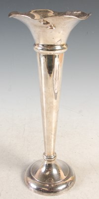 Lot 117 - A Birmingham silver bud vase with frilled rim,...