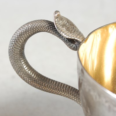 Lot 140 - An Indian silver three-handled cup and cover,...