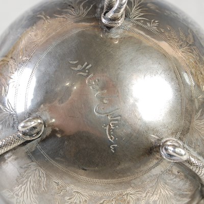 Lot 140 - An Indian silver three-handled cup and cover,...