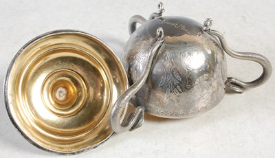 Lot 140 - An Indian silver three-handled cup and cover,...