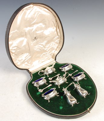 Lot 166 - A Birmingham silver seven piece cruet set in...