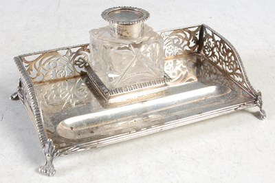 Lot 173 - A London silver rectangular desk stand, with...