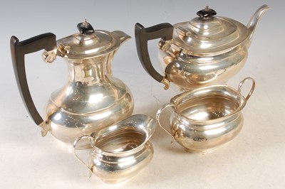 Lot 187 - A Sheffield silver four piece tea set...