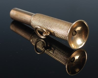 Lot 202 - A 9ct gold cigar piercer, 8.8 grams.