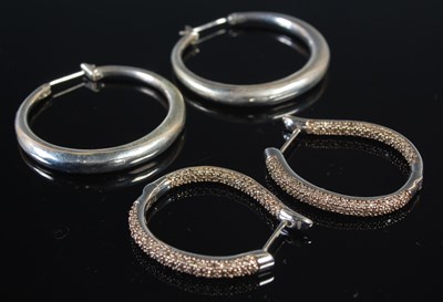 Lot 208 - Tiffany & Co, a pair of silver hoop earrings...