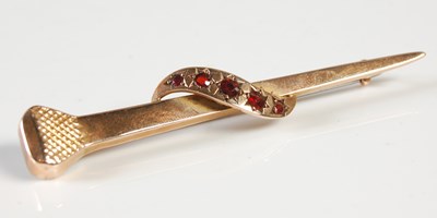 Lot 220 - Golf Interest - A 9ct gold and garnet set...