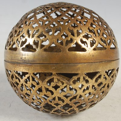 Lot 278 - A Middle Eastern pierced brass spherical hand...