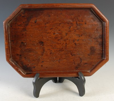 Lot 372 - A carved wood octagonal shaped tray with...