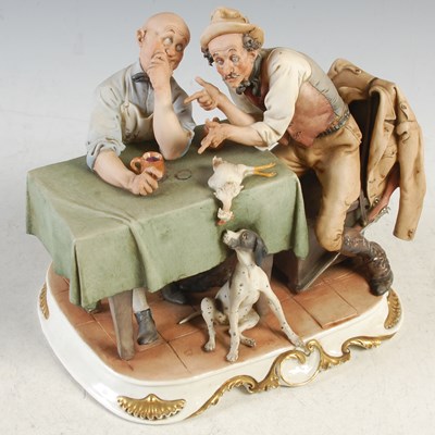Lot 391 - A Capodimonte ceramic figure of two huntsman...