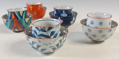 Lot 423 - Five assorted Japanese porcelain beaker cups...